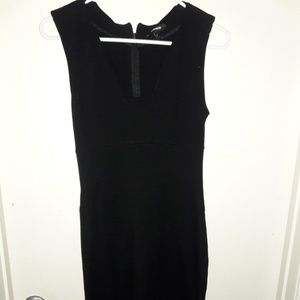 Small Black form fitting dress by Express